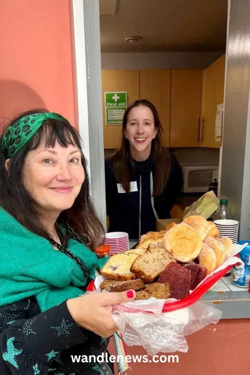 Fiona Warn and Lucy Mowatt with cakes at the Friendship Cafe