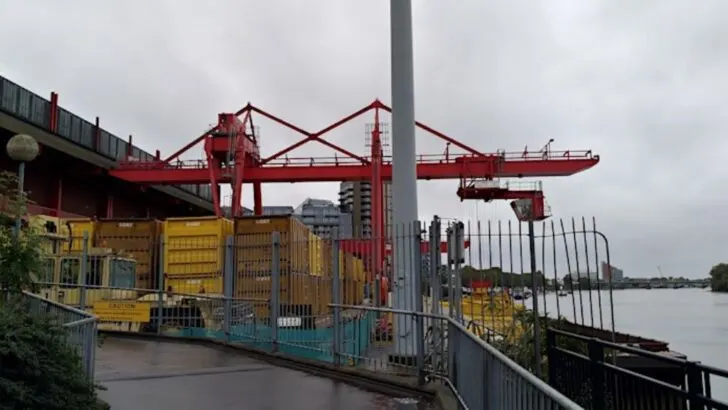 path by the river with construction work