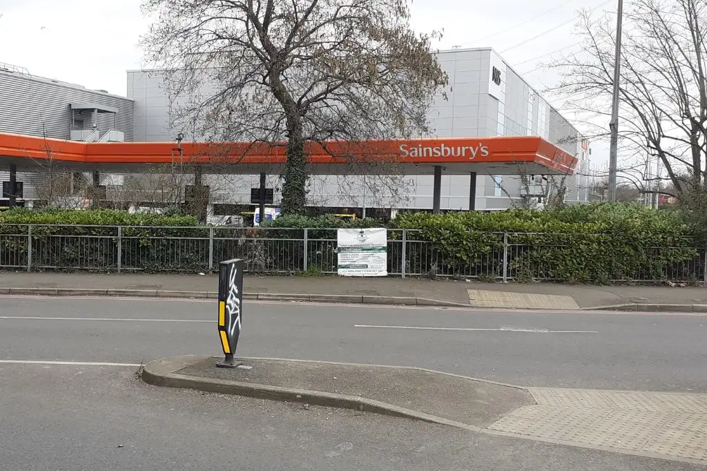 Modern-day view of the Sainsbury’s petrol station in Merton, located on the historic site of Merton Priory’s former West front.